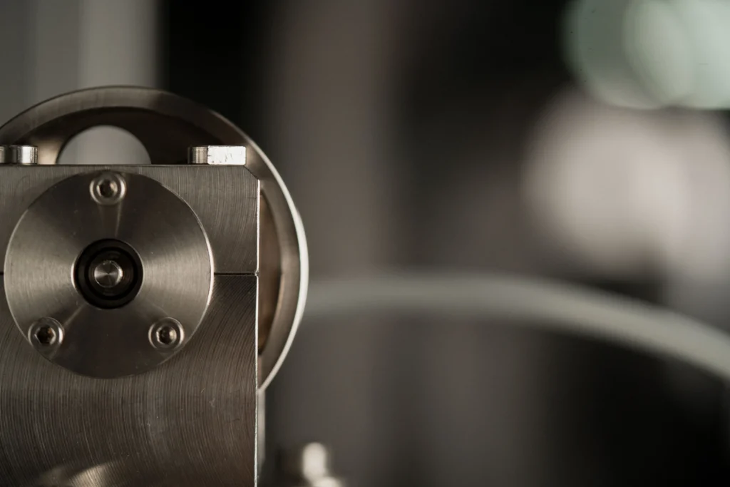 Production equipment used in the manufacturing of Subra’s advanced superconductor solutions, shown in a clean, high-tech industrial setting.