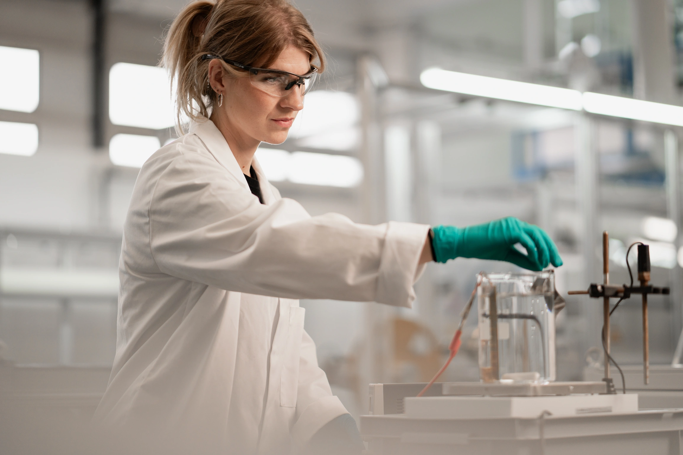 Subra team member working in the lab developing revolutionary superconductor solutions for zero-loss power transmission and fusion energy.